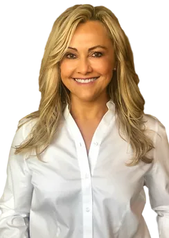 Ana Maria Madrid, a Physical Therapist at Arlington Physical Therapy, smiling in a white button-up shirt.