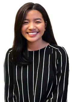 Neih Ngun, Billing Specialist at Arlington Physical Therapy, smiling in a black and white striped top.